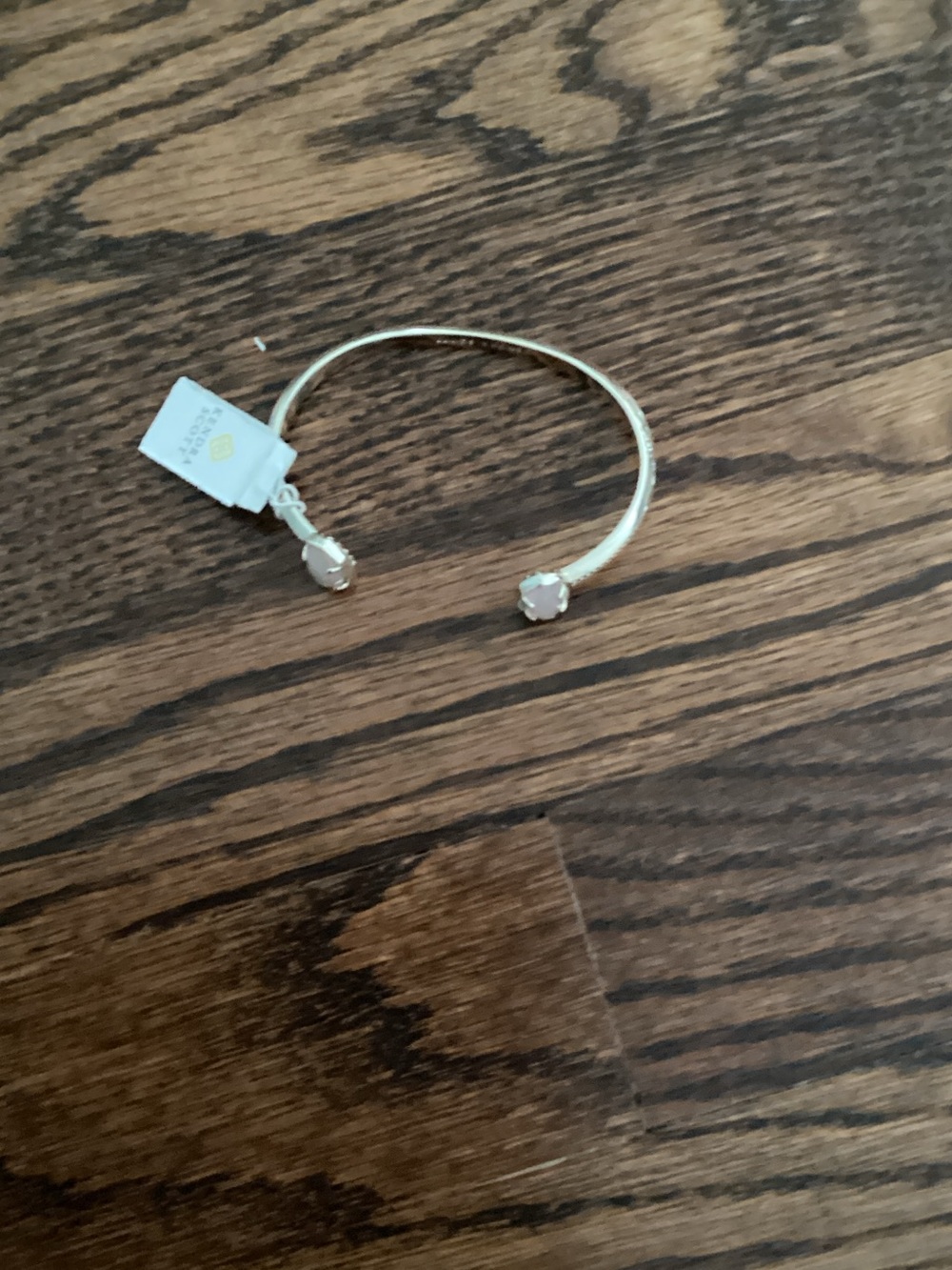 Kendra Scott gold open cuff with white stone accents
